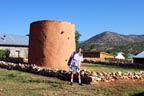 Sandra at tower built for defense from Comanches during Spanish settlement